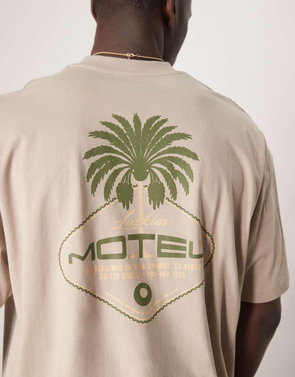 ASOS DESIGN boxy oversized t-shirt with palm graphic in beige Product Image