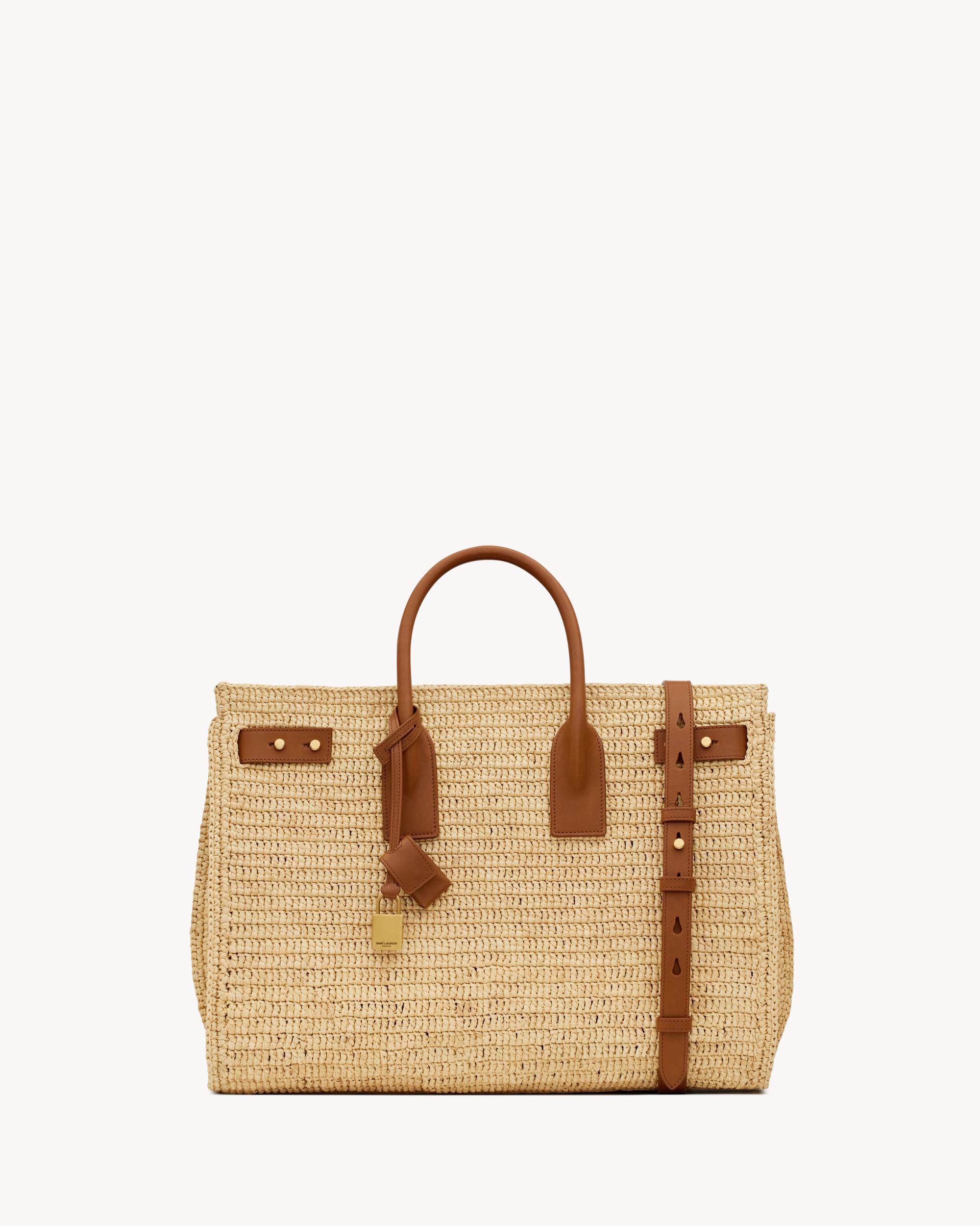 SAC DE JOUR supple in raffia and leather - MEDIUM Product Image
