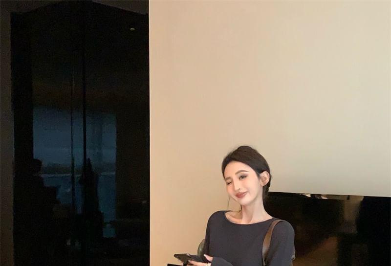 Long-Sleeve Plain Loose-Fit Knit Top / Striped Loose-Fit Pants Product Image