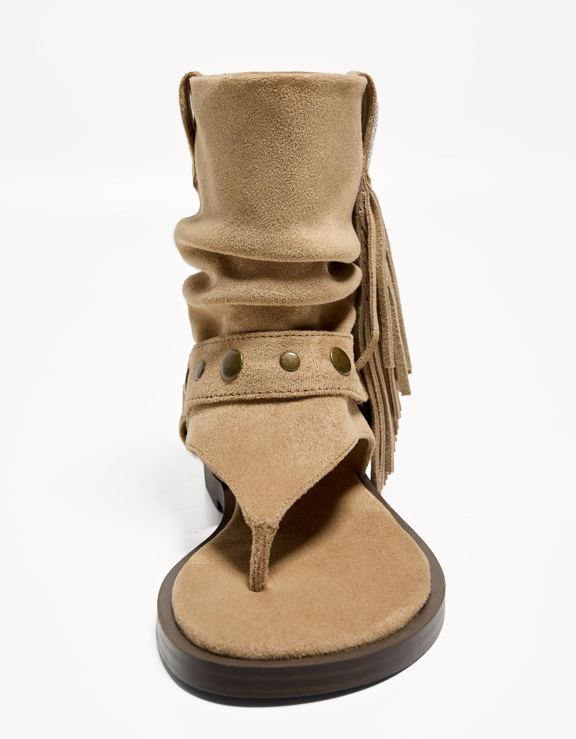 Flat sandals with fringed strap Product Image