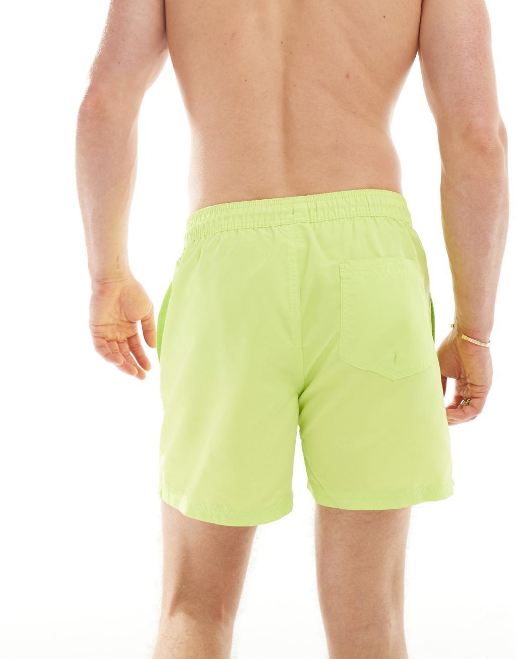 Jack & Jones swim shorts in lime green Product Image
