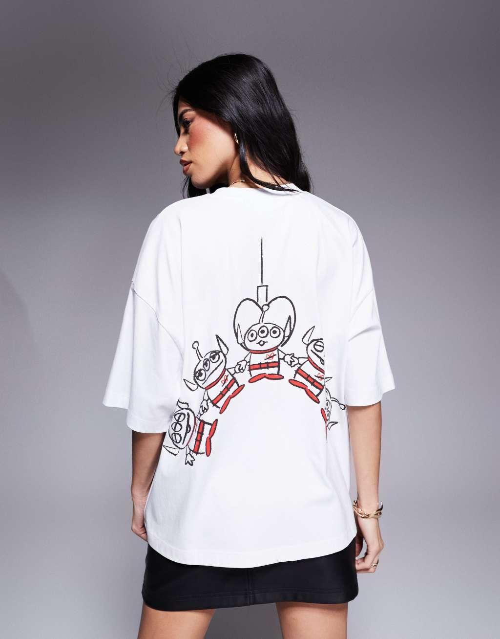 ASOS DESIGN Disney Pixar boxy oversized T-shirt with Toy Story Aliens prints in white Product Image