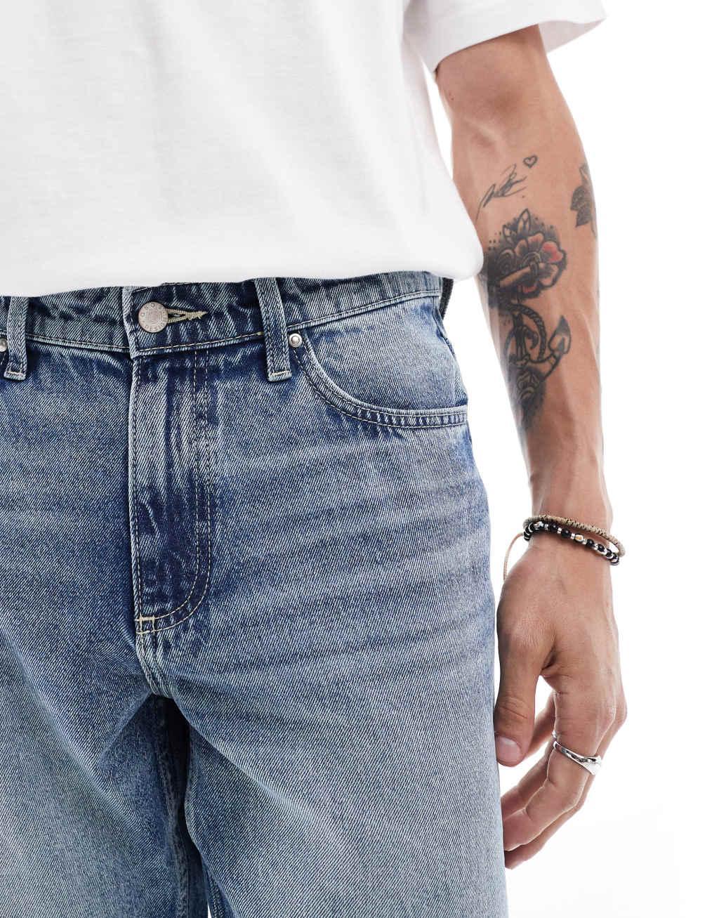 ASOS DESIGN tapered fit jeans in mid wash blue  Product Image