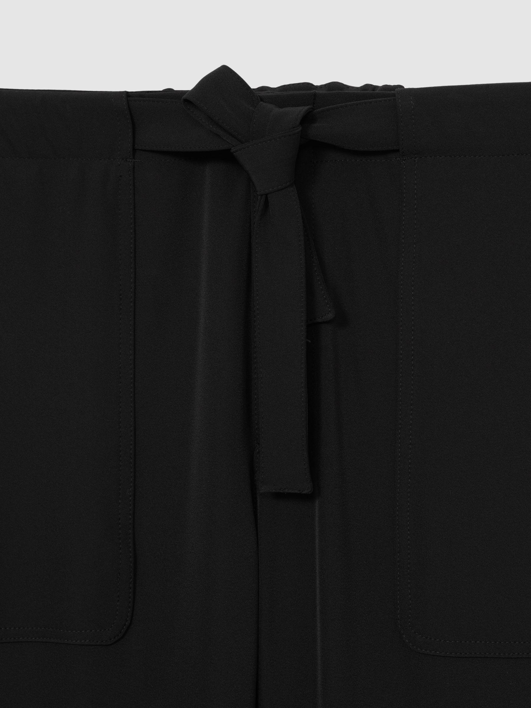 Belted Technical Tapered Trousers in Black Product Image