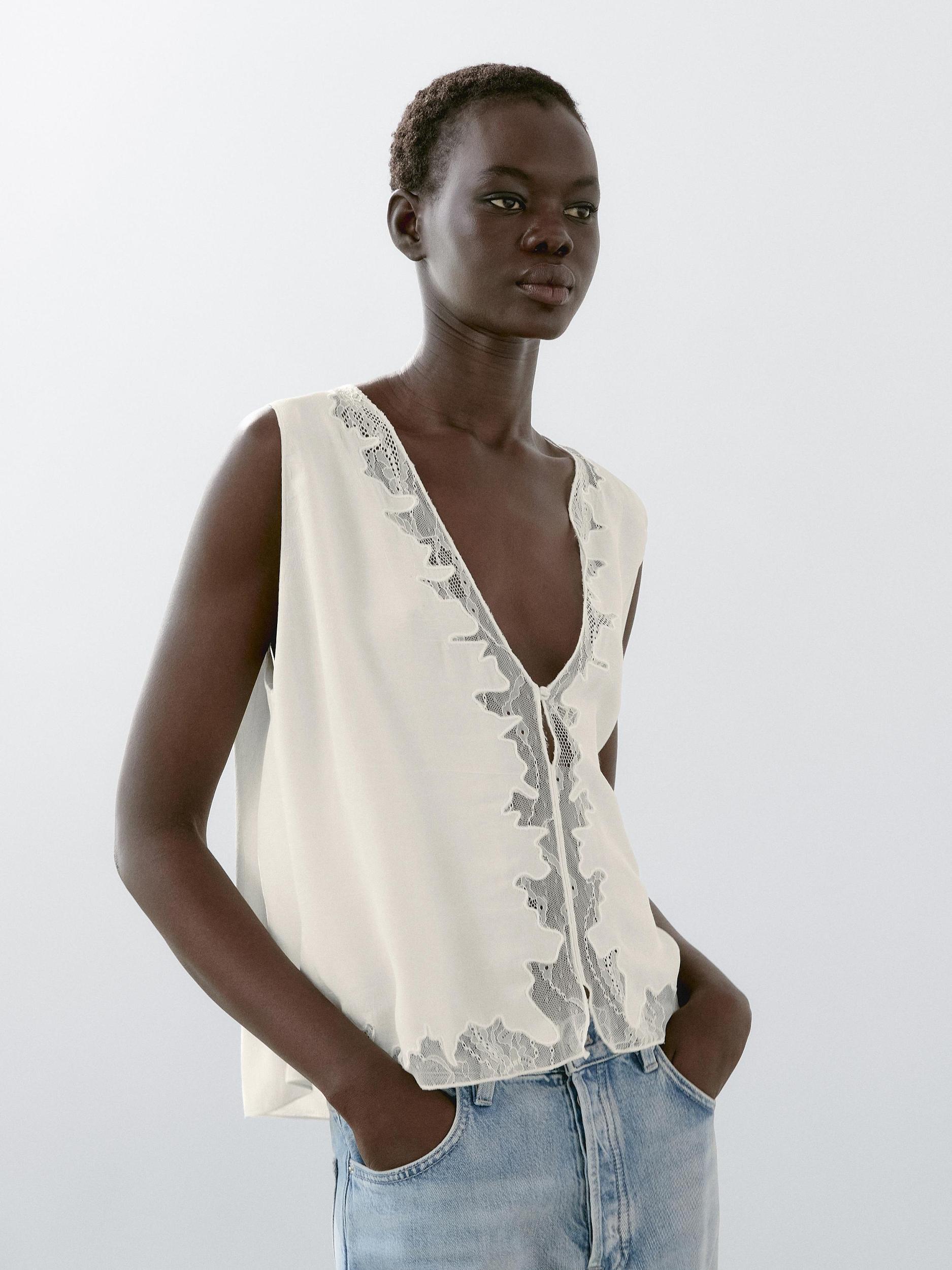 Flowing blouse with lace detail Product Image