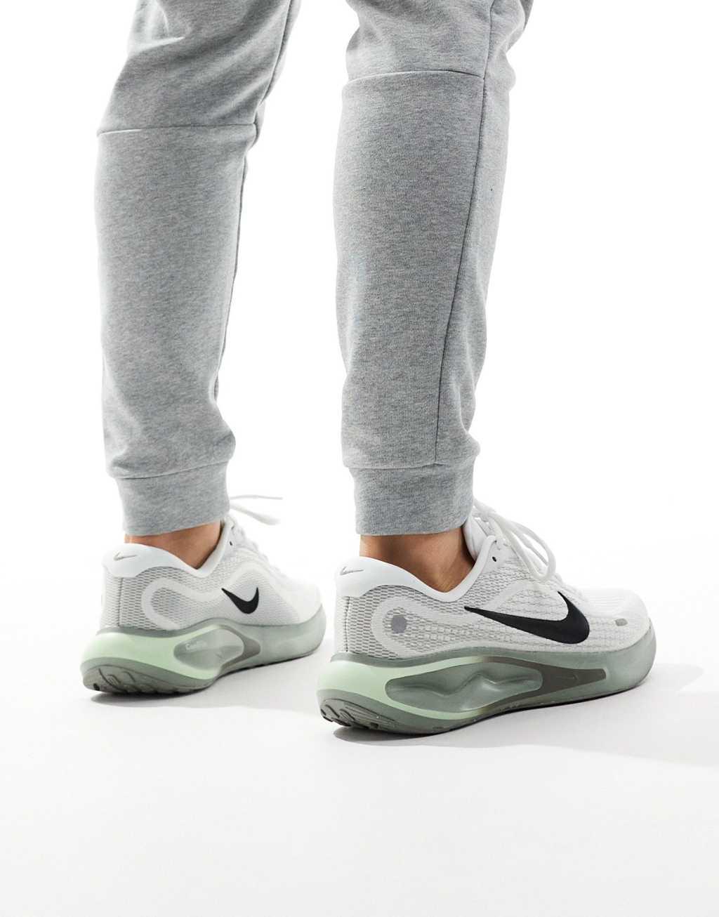 Nike Running Journey Run sneakers in white and light green Product Image