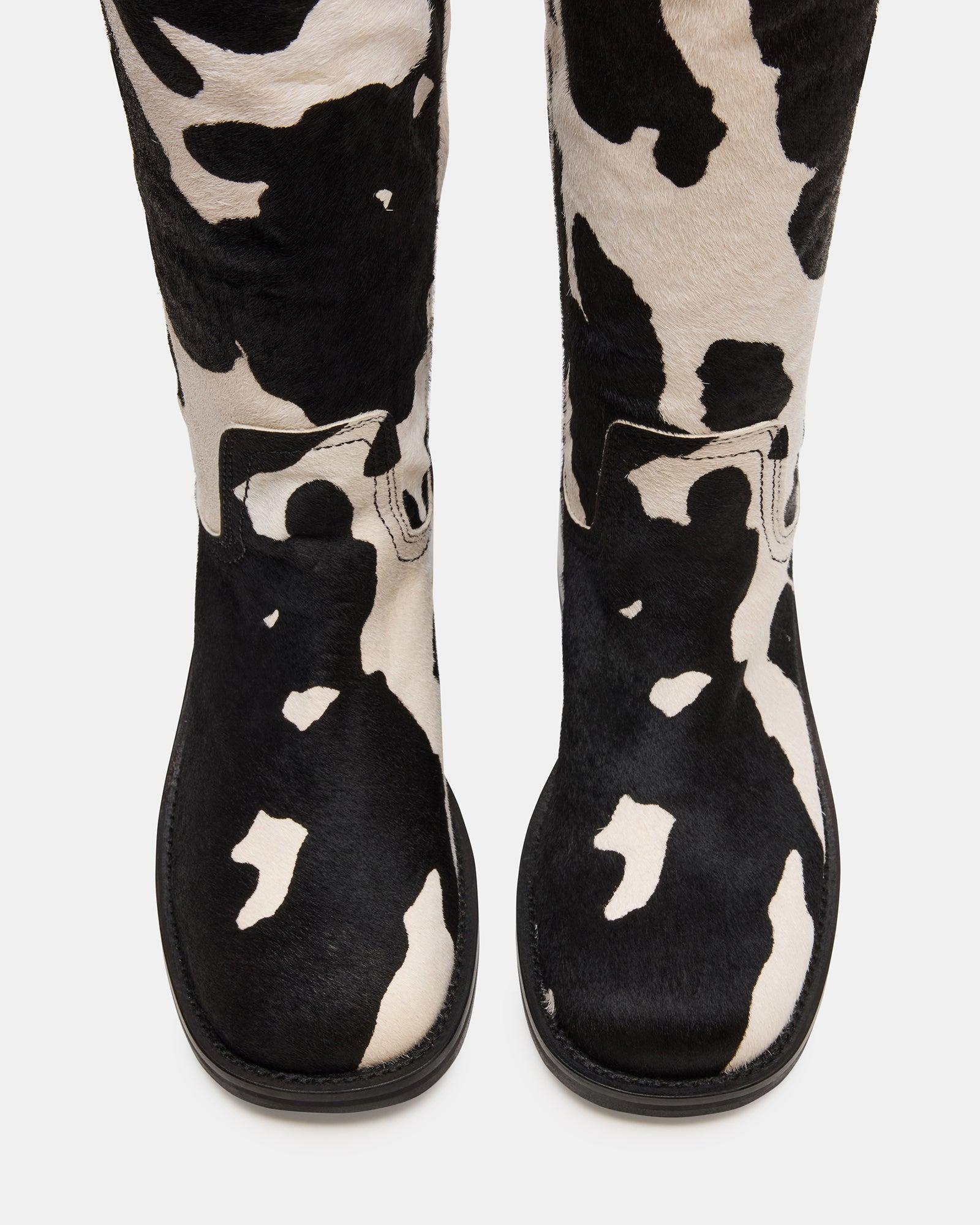 RIGGS BLACK COW PRINT WIDE CALF Female Product Image