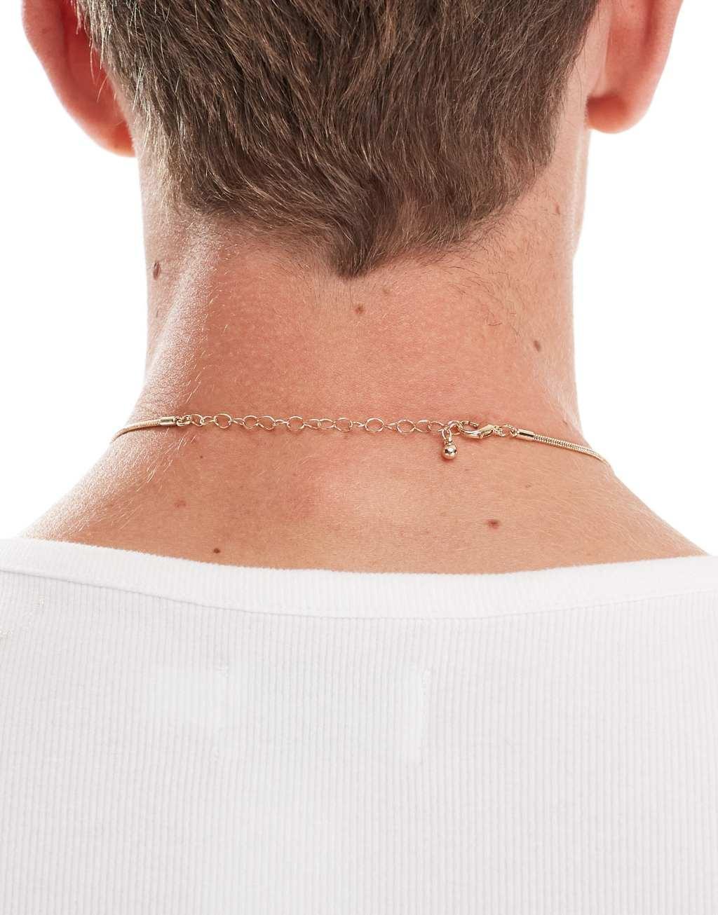 ASOS DESIGN necklace with square pendant with faux emerald crystal in gold tone Product Image