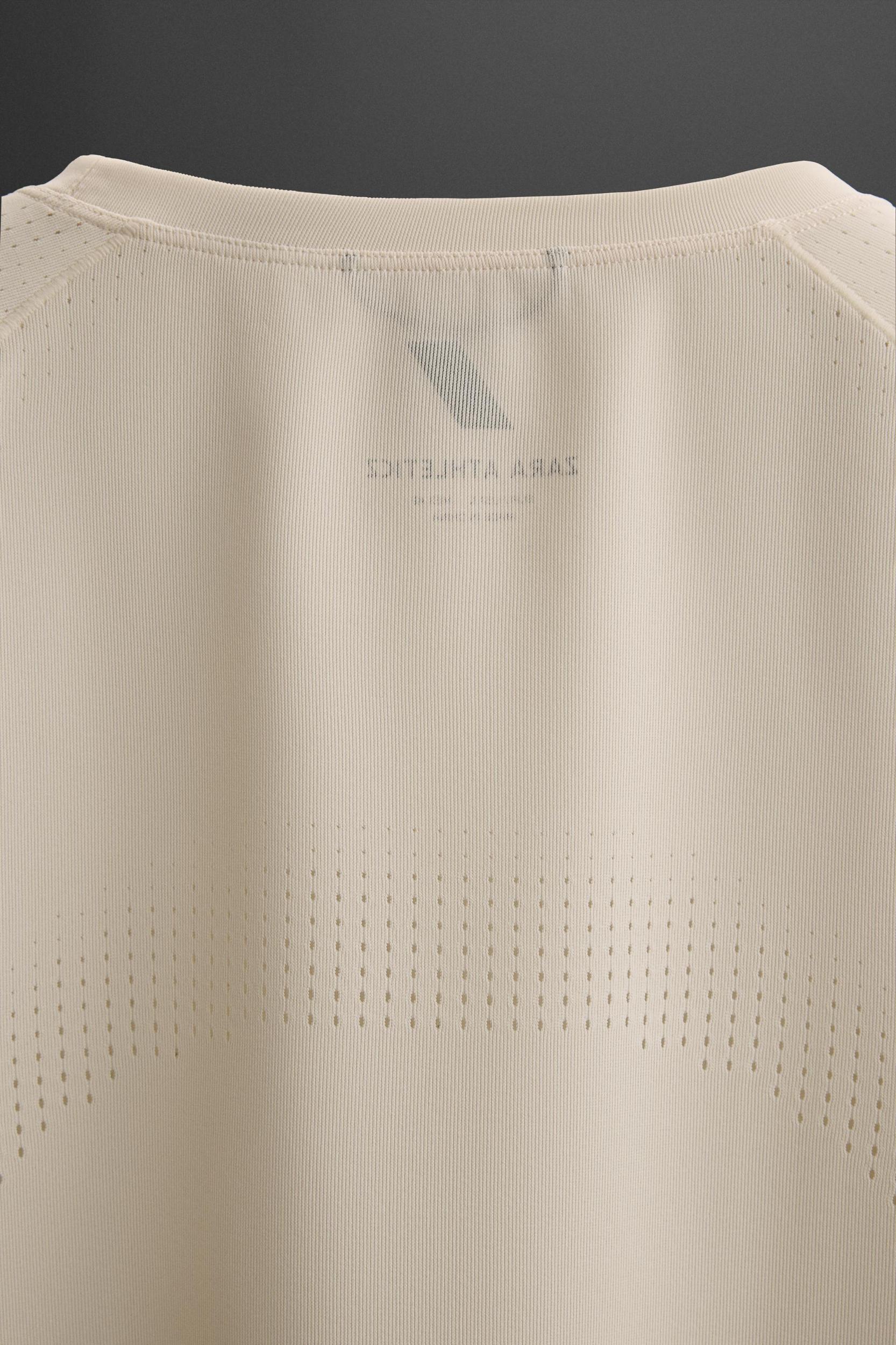 OPEN KNIT STRUCTURE T-SHIRT Product Image