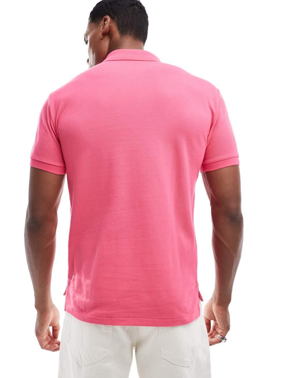Polo Ralph Lauren icon logo slim fit pique polo in pink Product Image