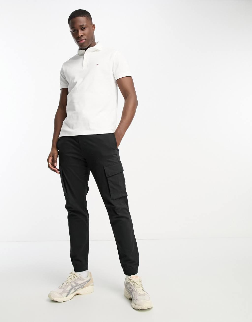 Tommy Hilfiger 1985 icon logo slim fit pique polo shirt in white Product Image