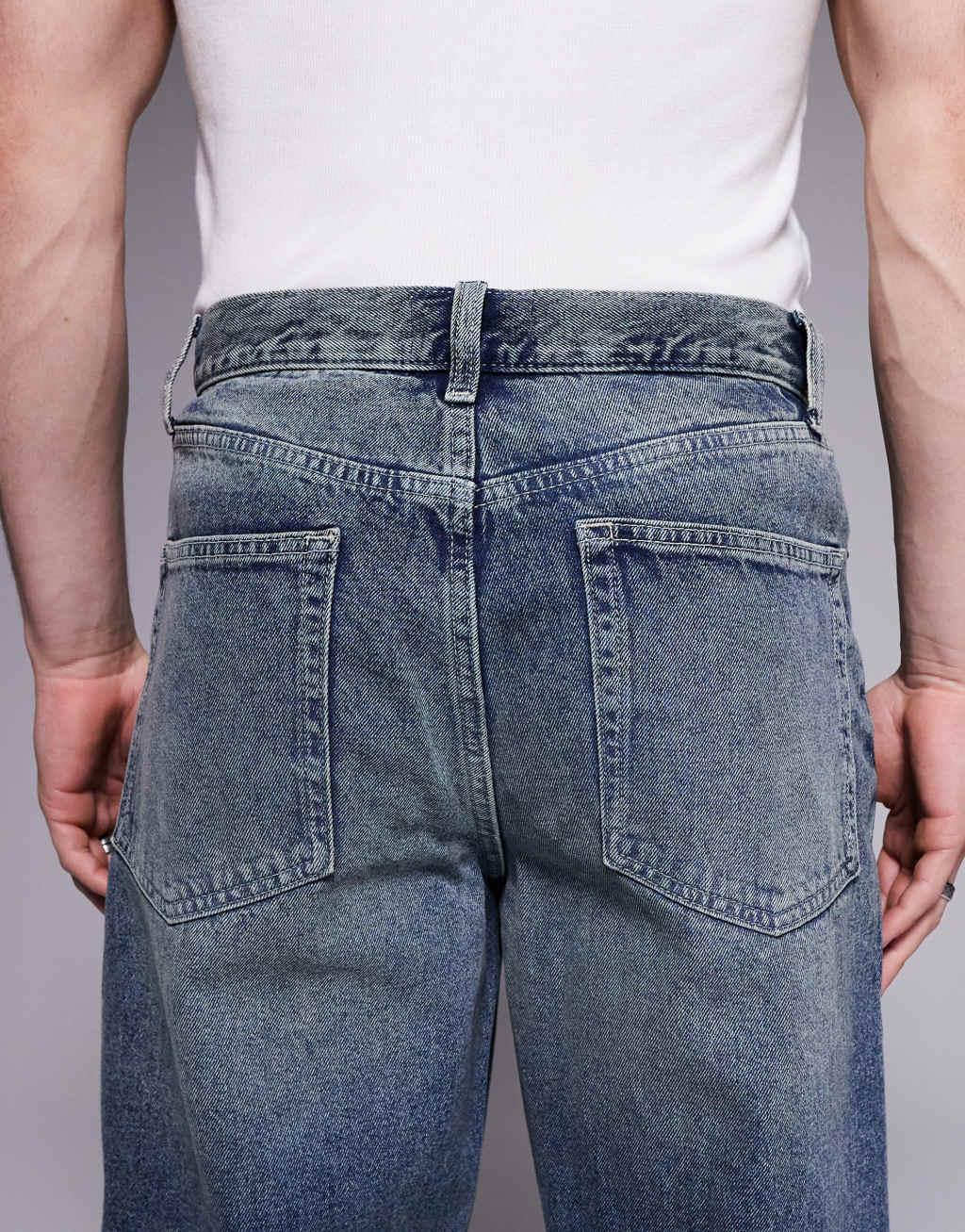 ASOS DESIGN baggy fit jeans in dark wash blue Product Image