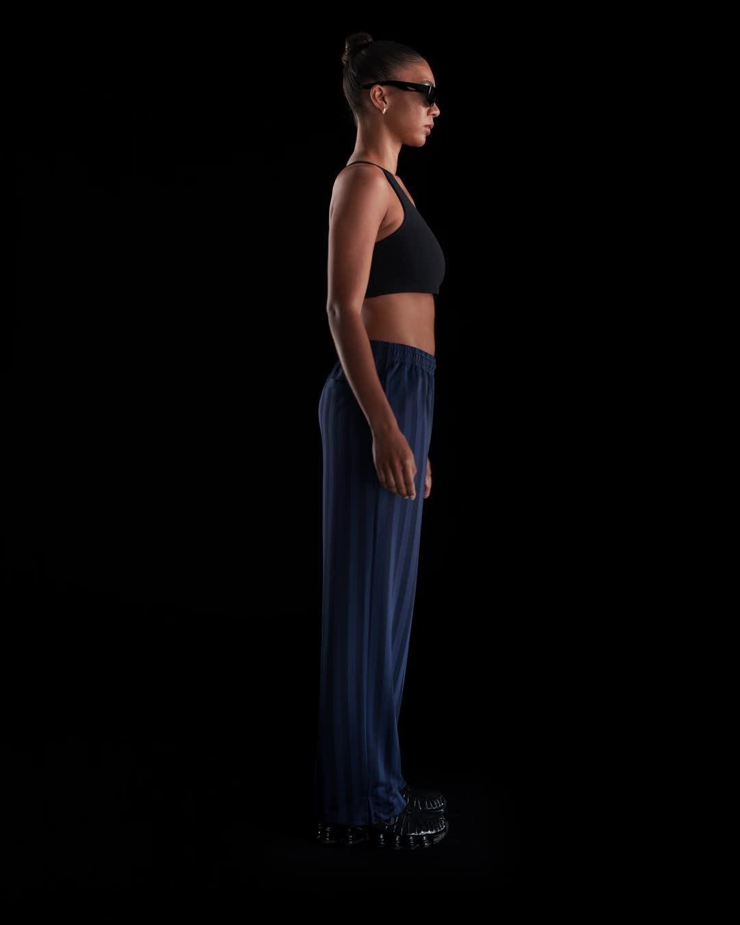 Nike Sportswear Women's Mid-Rise Loose Jacquard Striped Track Pants Product Image