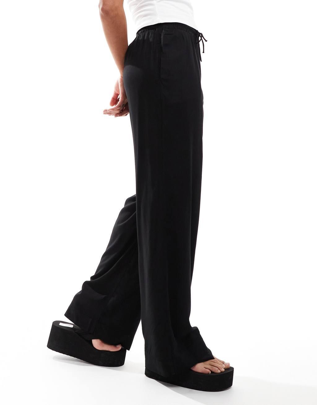Monki drawstring waist pants in black Product Image