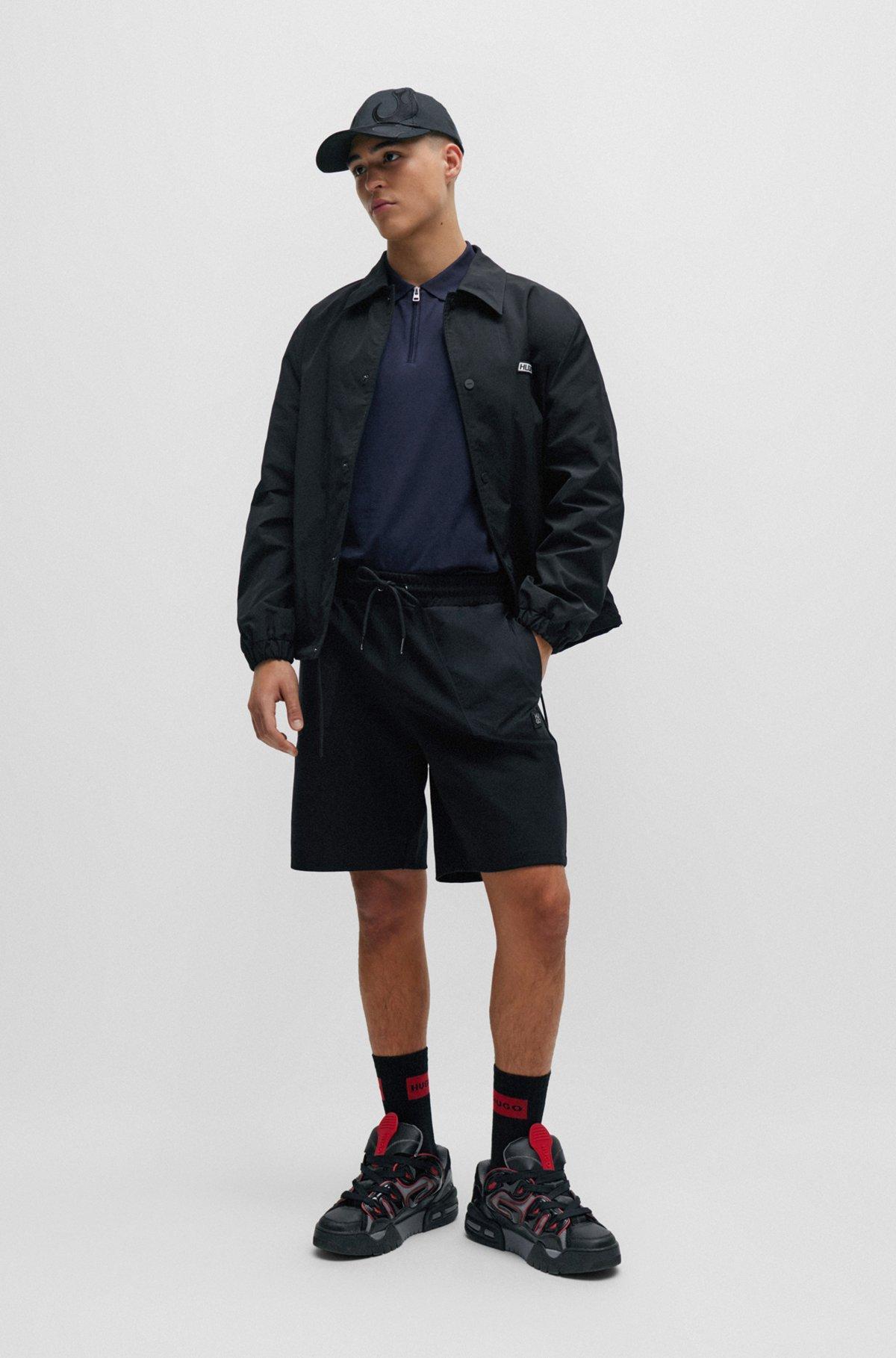Cotton-blend polo shirt with zip placket Product Image