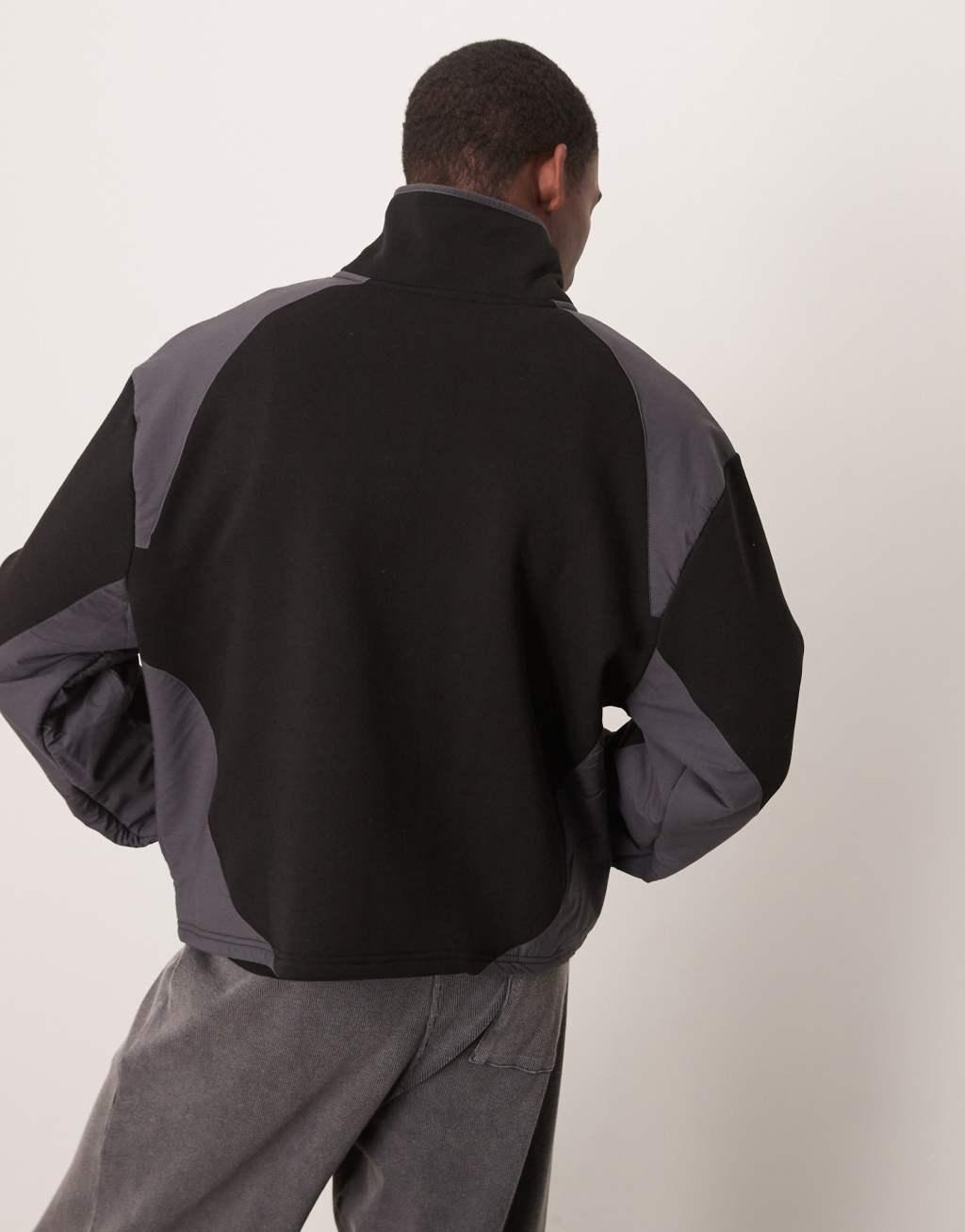 ASOS DESIGN oversized boxy sweater with contrast nylon panels in black fleece Product Image