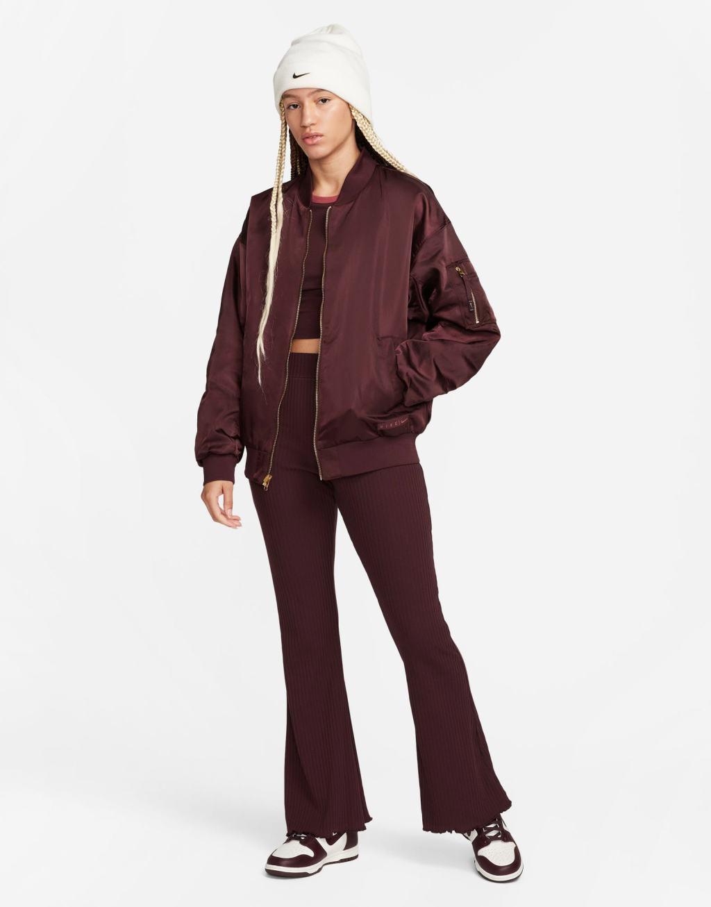 Nike Road To Wellness bomber jacket in burgundy Product Image