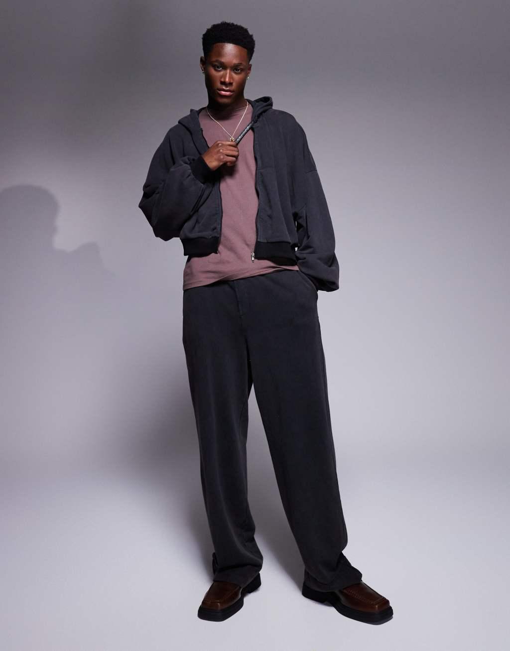 ASOS DESIGN super baggy sweatpants with cuffed hems in washed black Product Image