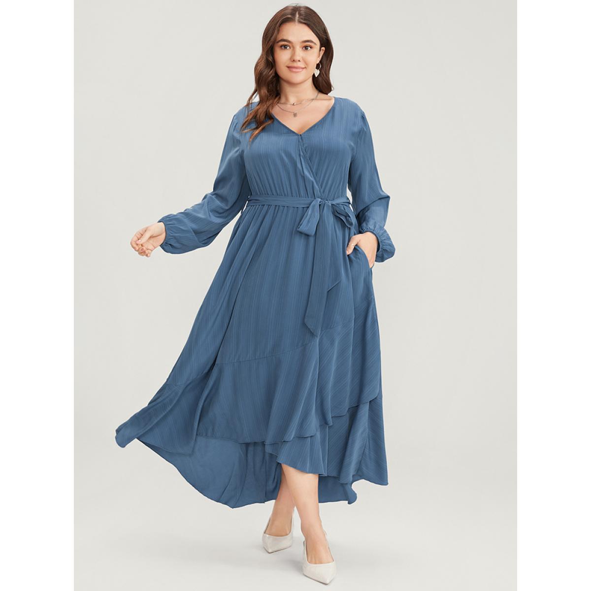 Plus Size Solid Surplice Neck Lantern Sleeve Pocket Belted Asymmetrical Hem Dress Cerulean Women Elegant Asymmetrical V-neck Long Sleeve Curvy Midi Dress BloomChic 22-24/3X Product Image