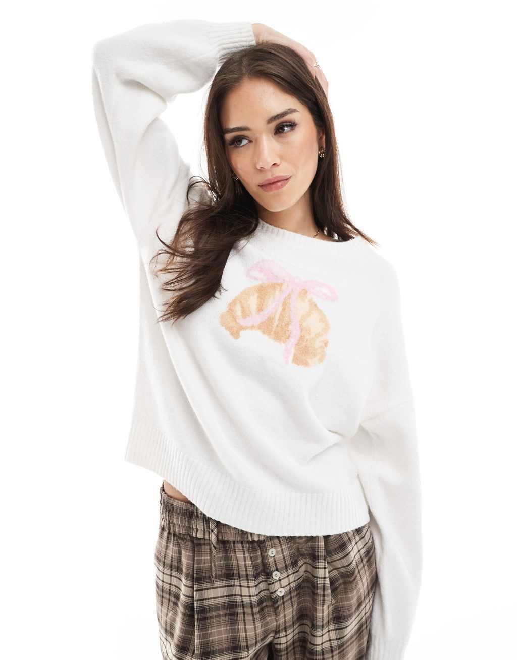 Hollister knitted croissant graphic sweater in cream Product Image