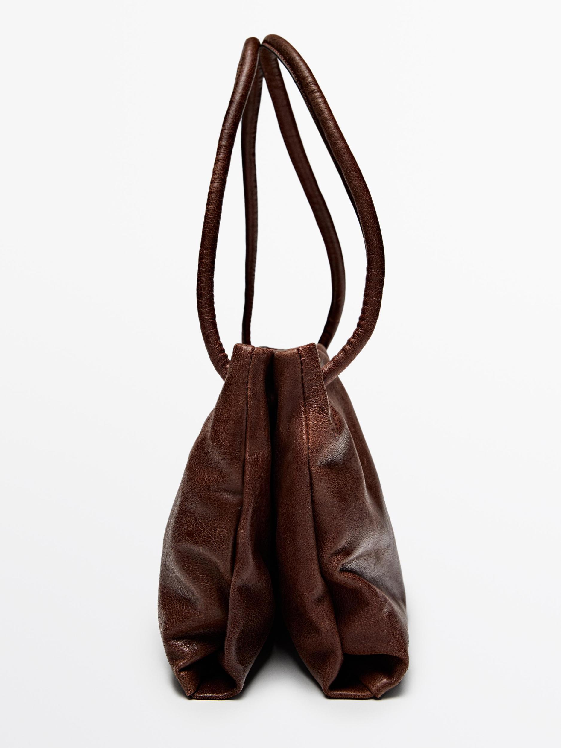 Small nappa leather bag with compartments Product Image