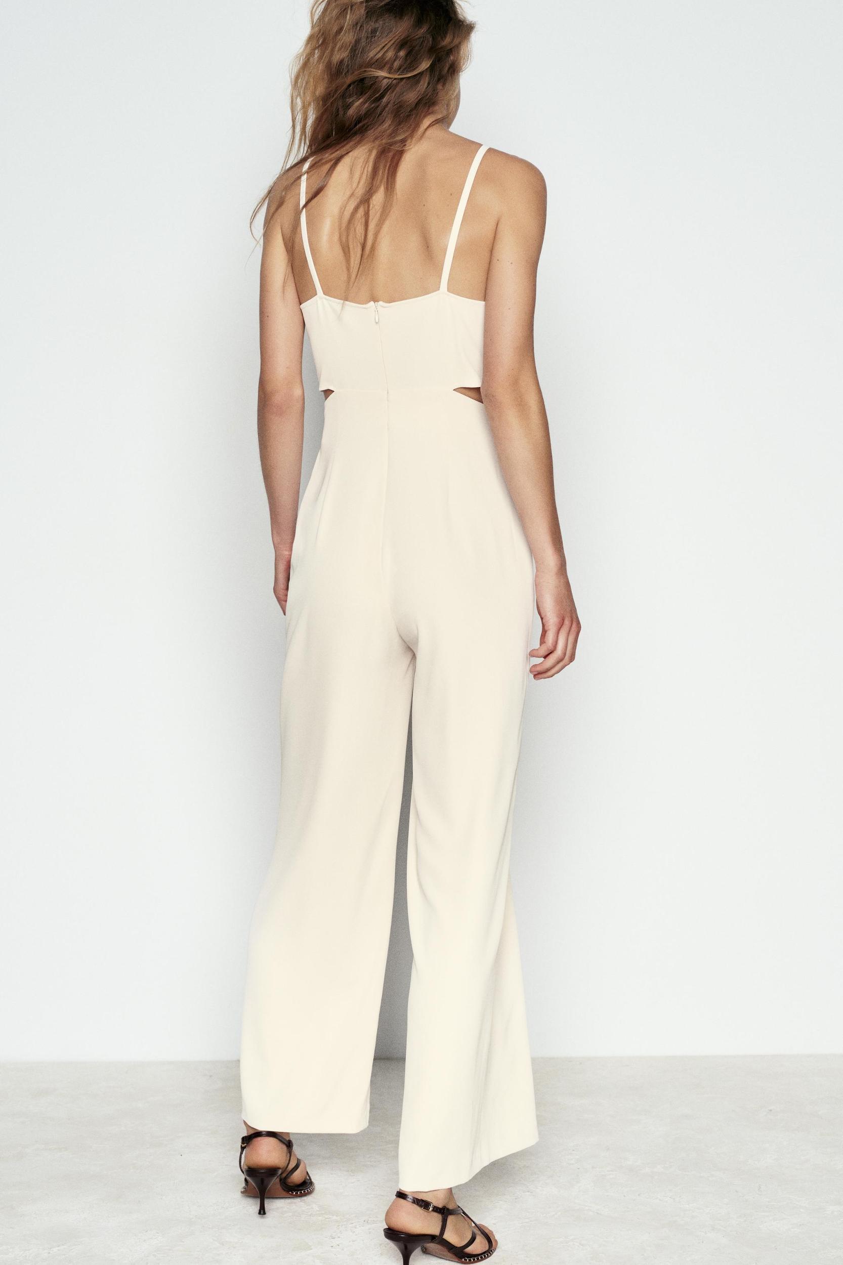 WIDE JUMPSUIT WITH CUT OUT Product Image