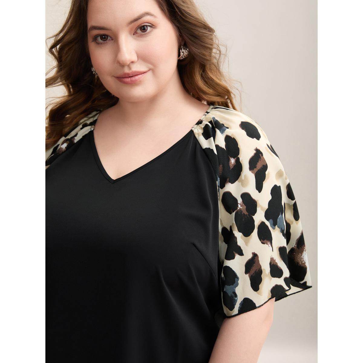 Plus Size Black Leopard Print Spliced V-Neck Blouse Women At the Office Short sleeve V-neck Work Blouses BloomChic 30/6X Product Image