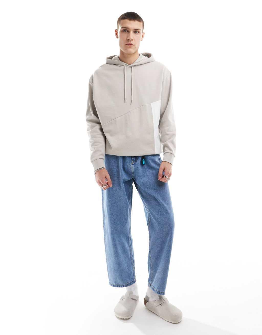 ASOS DESIGN oversized hoodie with nylon pocket in beige Product Image