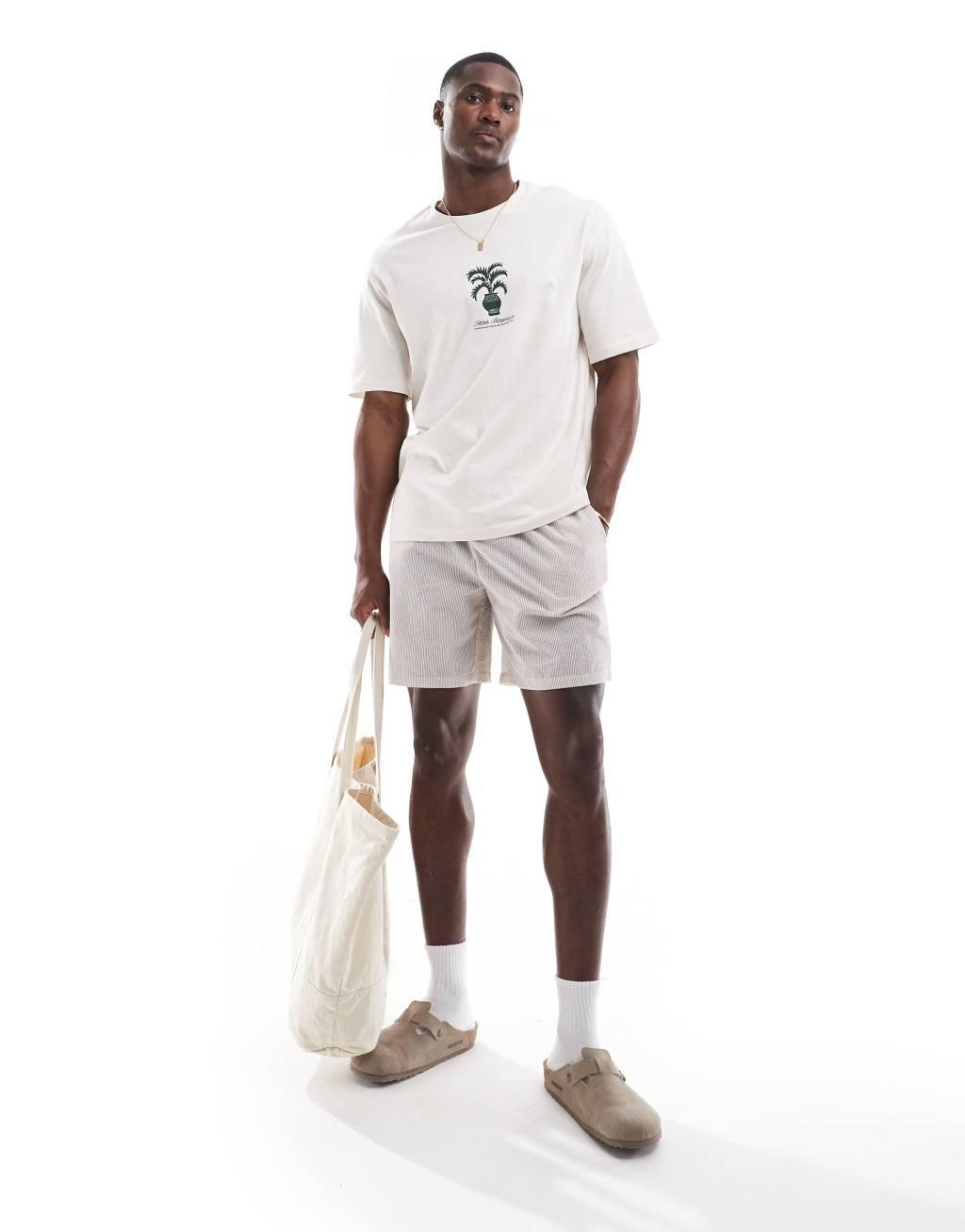 Selected Homme oversized t-shirt with central plant print in cream Product Image