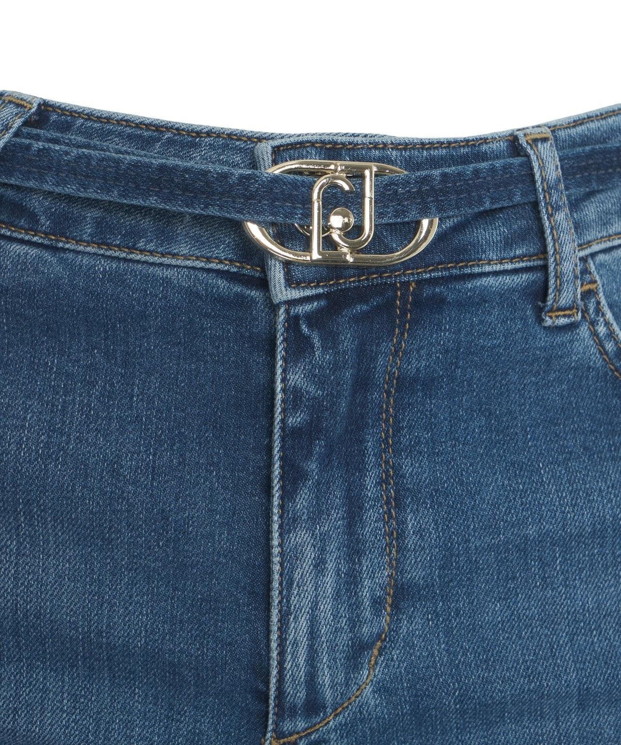 Flared jeans with belt Product Image