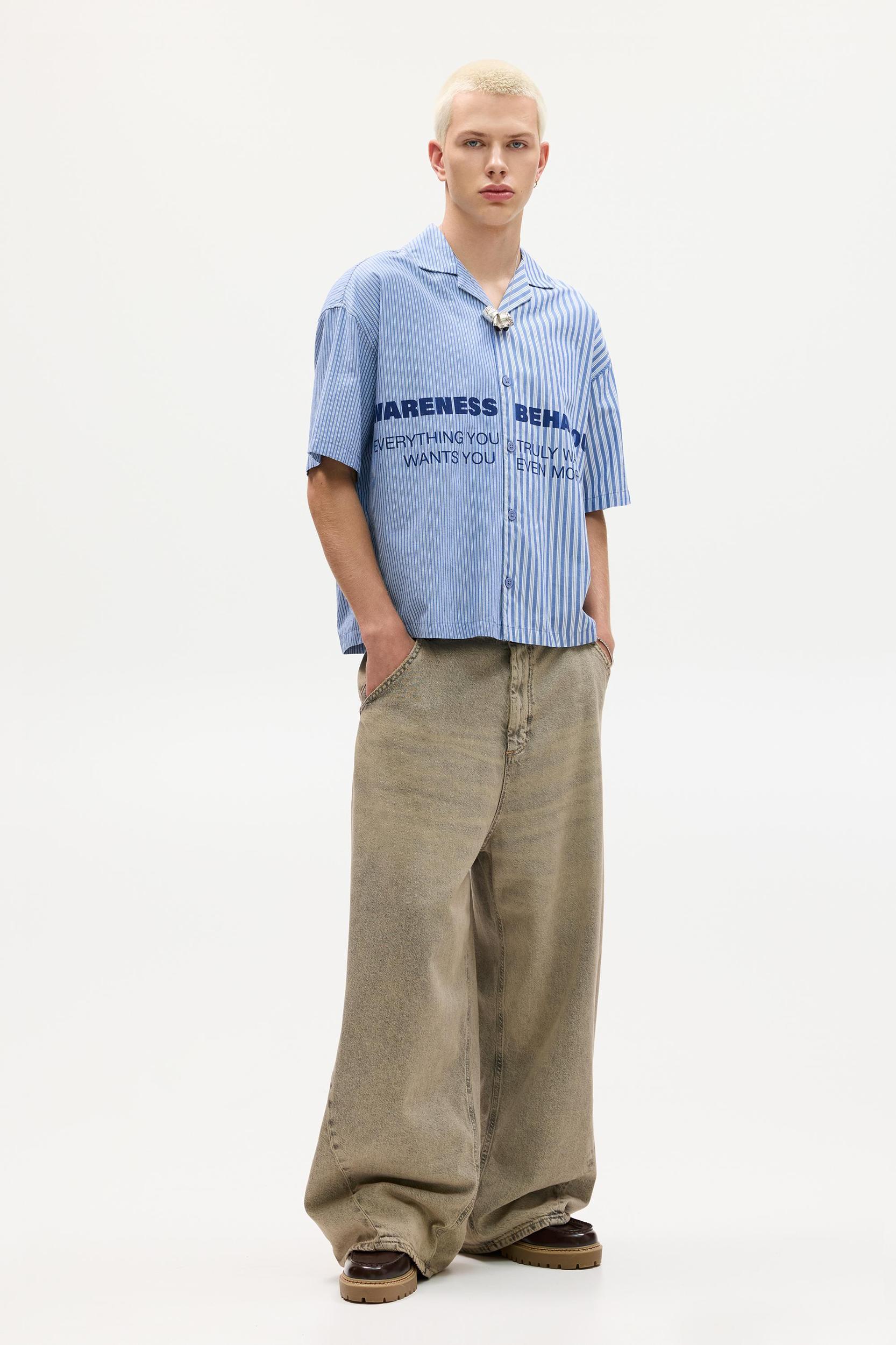 Short sleeve shirt with asymmetrical stripes Product Image