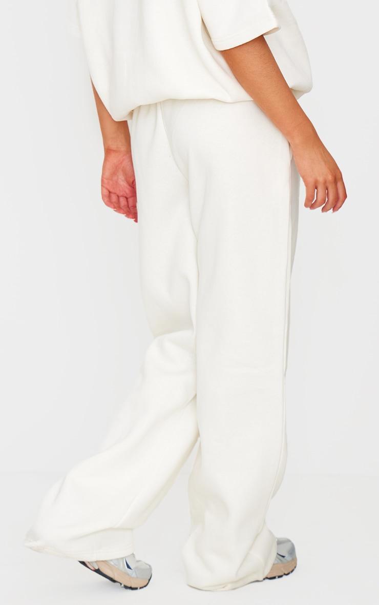 PRETTYLITTLETHING Cream Badge Detail Mid Rise Wide Leg Sweatpants Product Image