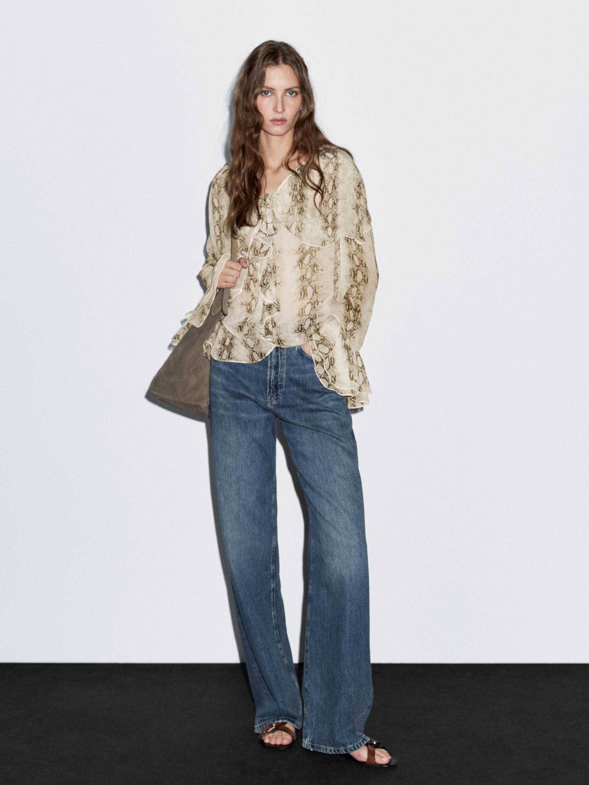 Snakeskin print blouse with ruffles Product Image