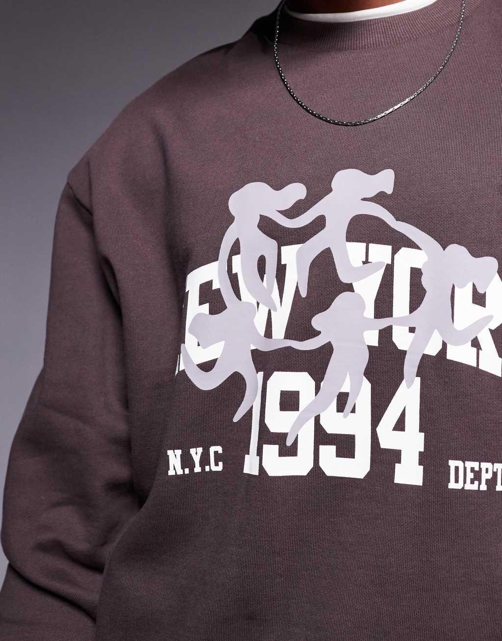 ASOS DESIGN boxy oversized sweatshirt with 1994 print in brown Product Image