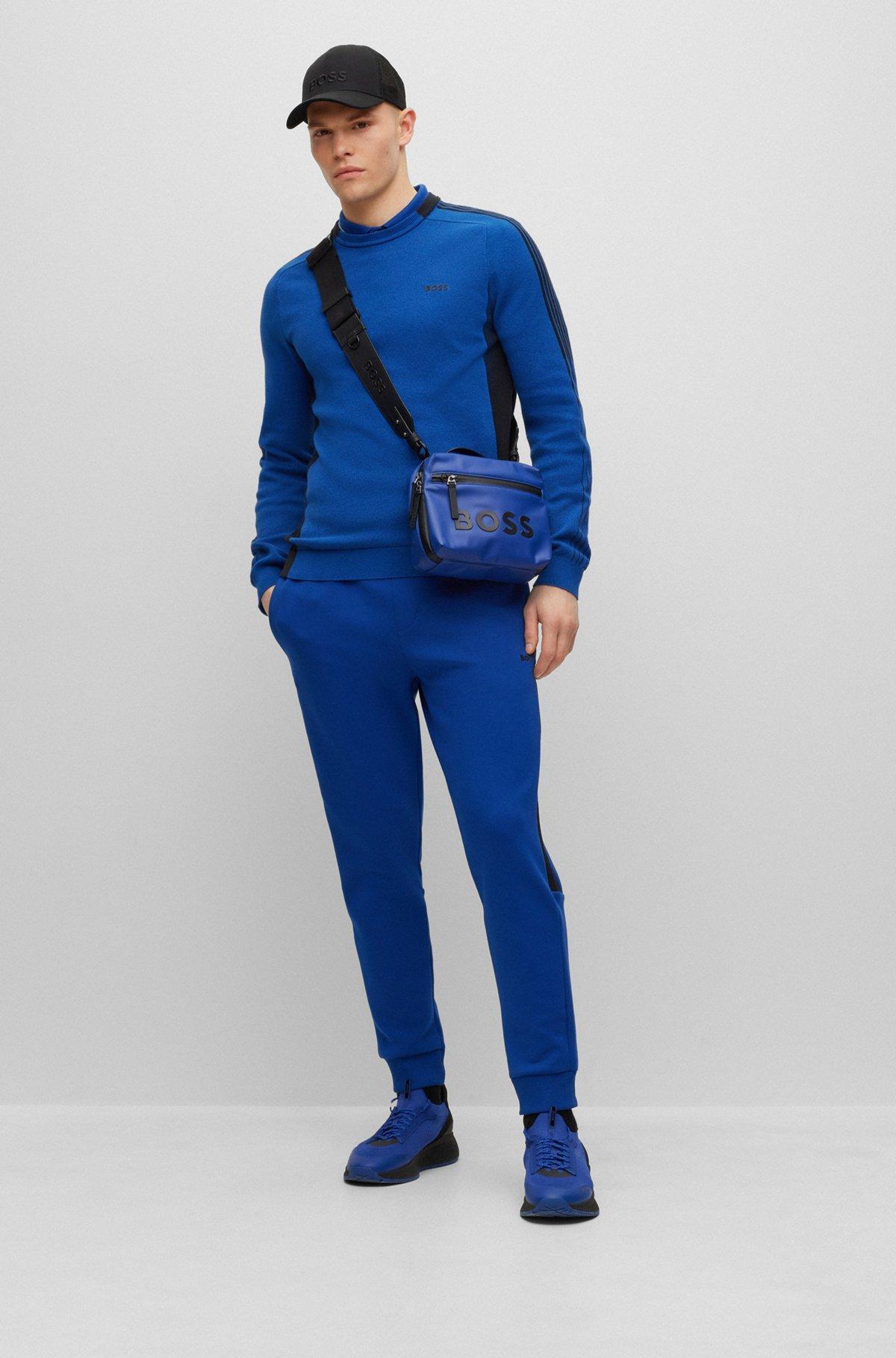 Cotton-blend tracksuit bottoms with side-stripe tape Product Image