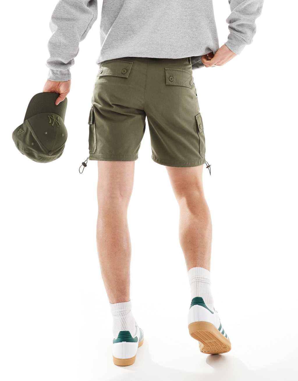 ASOS DESIGN slim cargo shorts in khaki Product Image