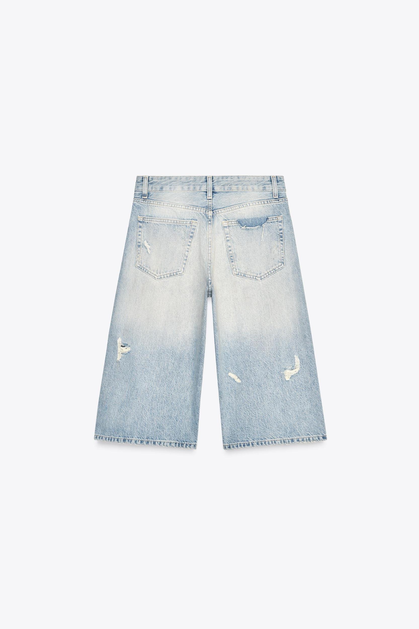 MID-RISE RIPPED DENIM BERMUDA JORTS Product Image