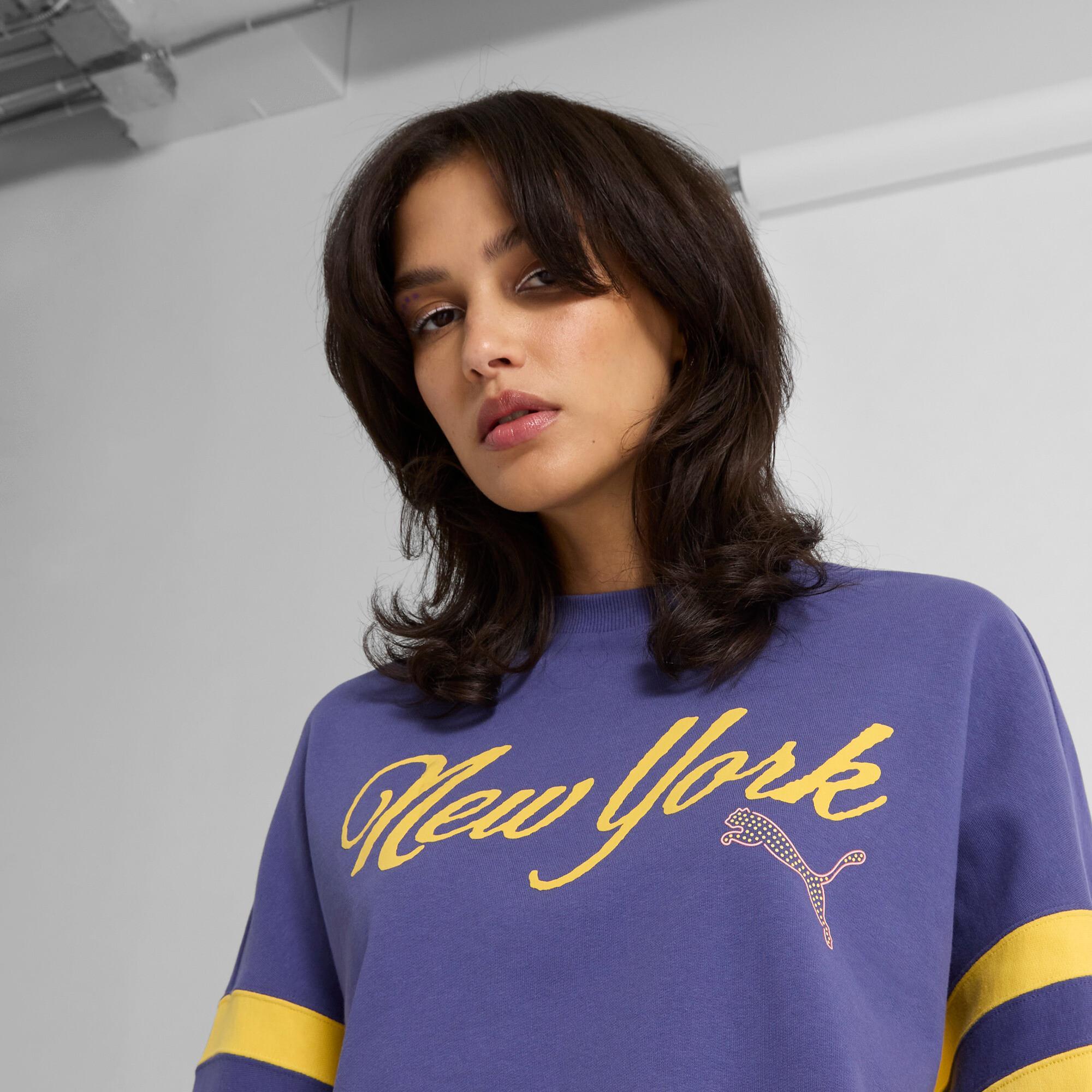 PUMA Wardrobe Essentials Bright Lights NYC Flagship Women's Crew Sweatshirt Product Image