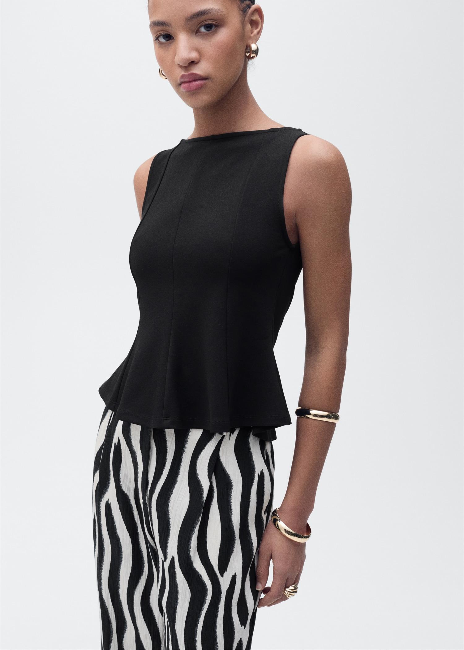 Peplum top with seam detail - Women | MANGO USA Product Image