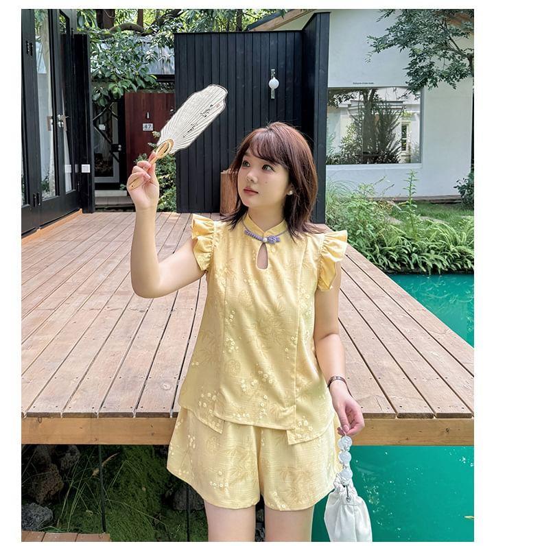 Plus Size Cap-Sleeve Stand Collar Floral Print Cutout Frog Buttoned Blouse Product Image