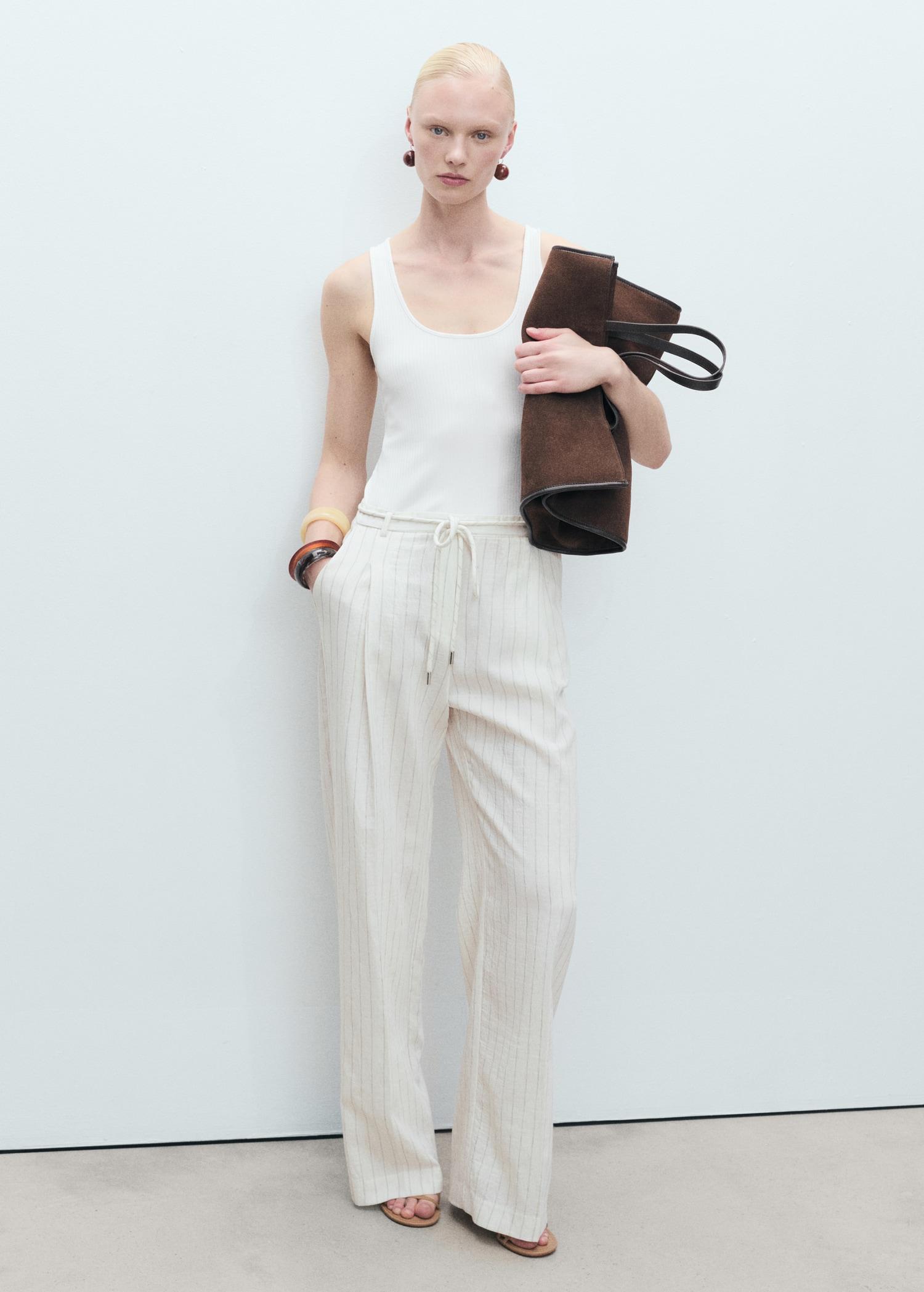 Striped combined knitted jumpsuit - Women | MANGO USA Product Image