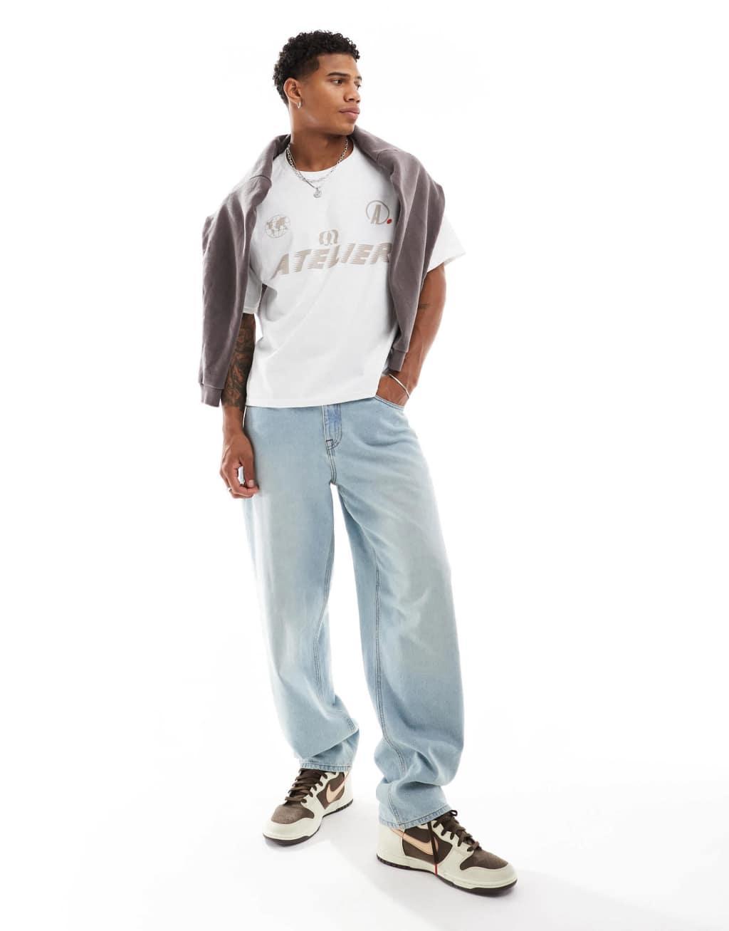 ASOS DESIGN boxy oversized t-shirt with sports graphic in white Product Image
