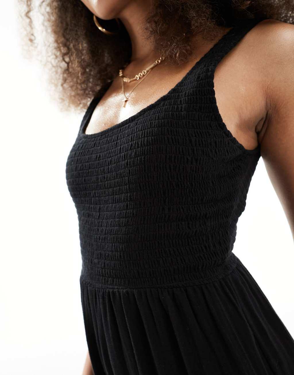 ASOS DESIGN scoop neck wide leg jumpsuit in black Product Image