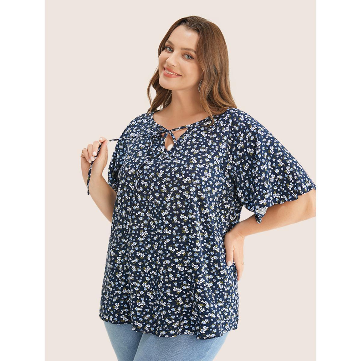 Plus Size Indigo Ditsy Floral Ruffle Sleeve Tie Neck Blouse Women Elegant Short sleeve V-neck Everyday Blouses BloomChic 10/M Product Image