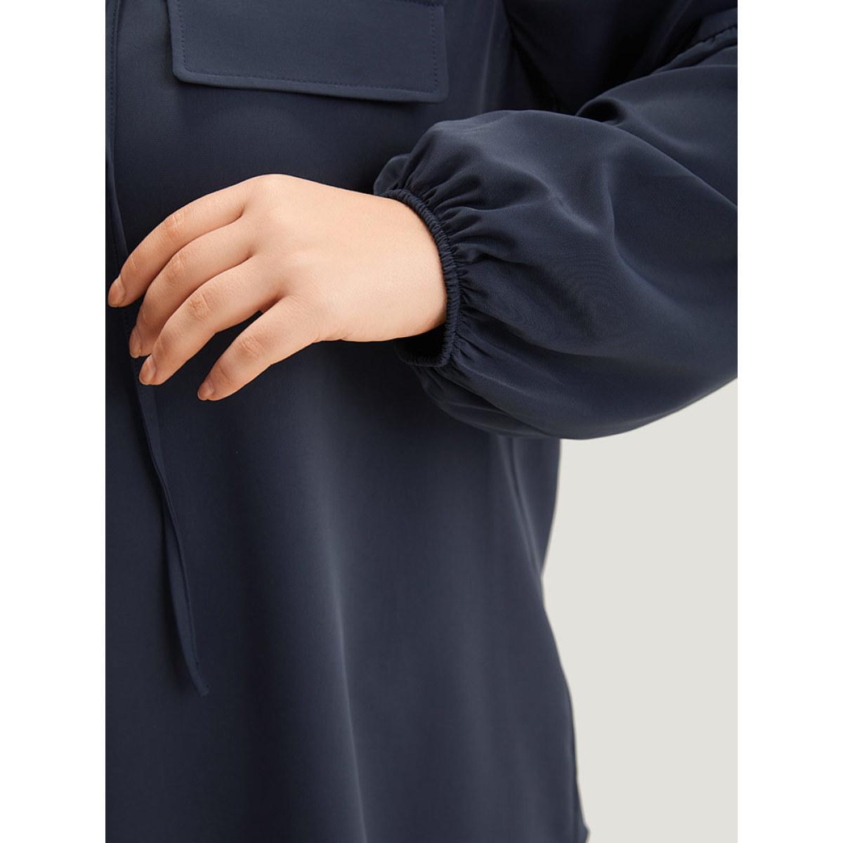 Plus Size Indigo Solid Elastic Cuffs Lace Up Blouse Women Office Long Sleeve V-neck Work Blouses BloomChic 12/L Product Image