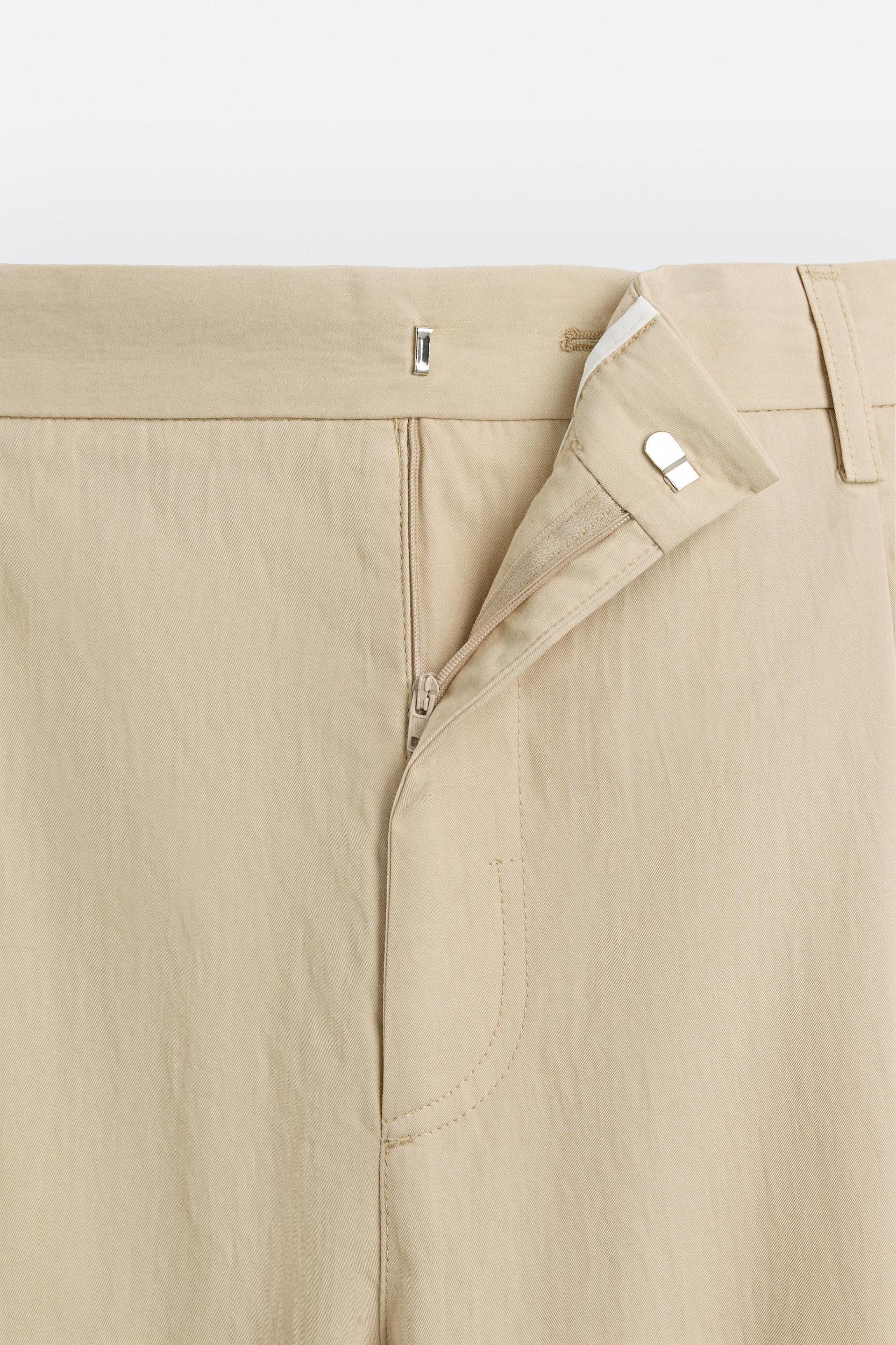 LIMITED EDITION RELAXED FIT PLEATED PANTS Product Image