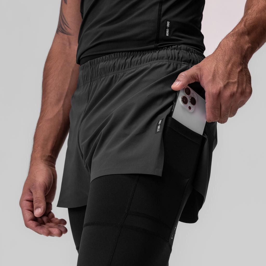 0911. Tetra-Lite® 2-in-1 High Split Legging Short - Black "Cyber"/Black Male Product Image
