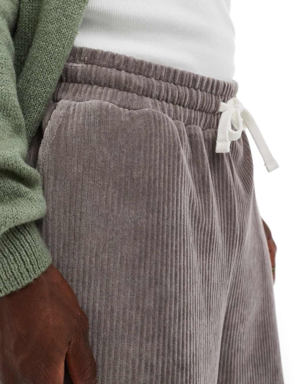 ASOS DESIGN oversized ribbed velour shorts in light brown Product Image