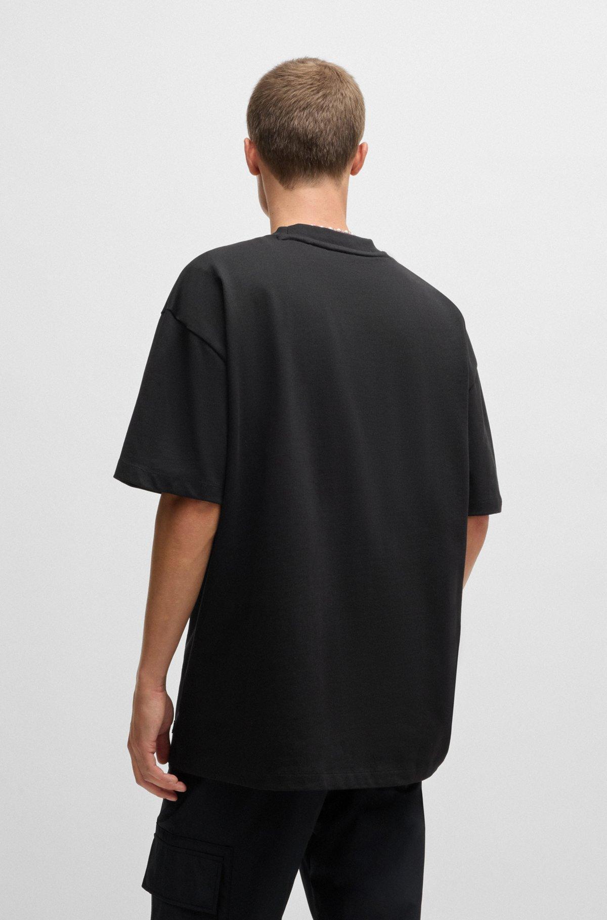 Oversize-fit all-gender T-shirt in cotton with logo label Product Image