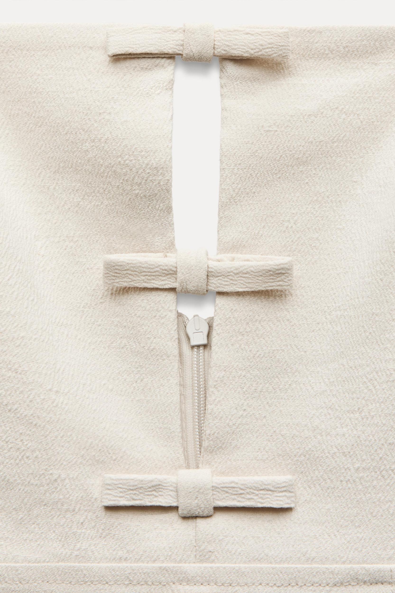CUT OUT BOWS MIDI DRESS Product Image